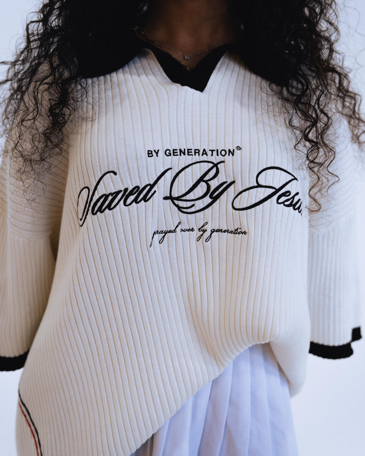 "SAVED BY JESUS" - BLACK KNIT POLO